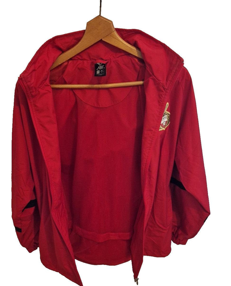 A red FBT Doncaster Rovers football training zip-up jacket in size UK small.