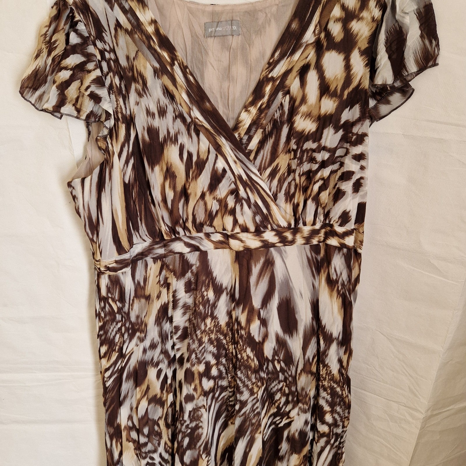 A brown and beige animal print chiffon maxi dress by Per Una with short ruffled sleeves.