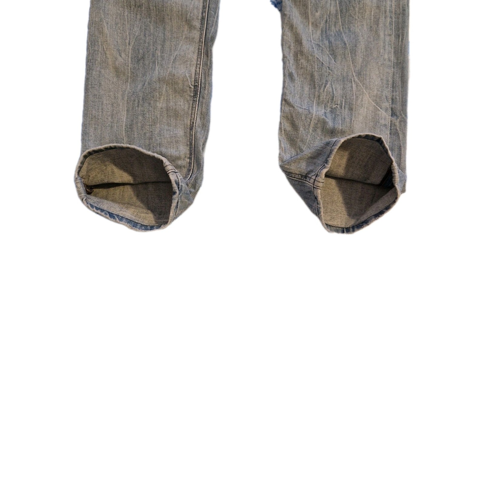 The bottom portion of Diesel men's straight fit jeans in a vintage blue denim wash.