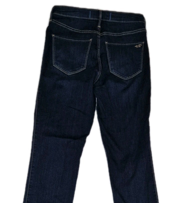 Hollister men's slim fit jeans in a dark blue wash with an ultra high rise back view.