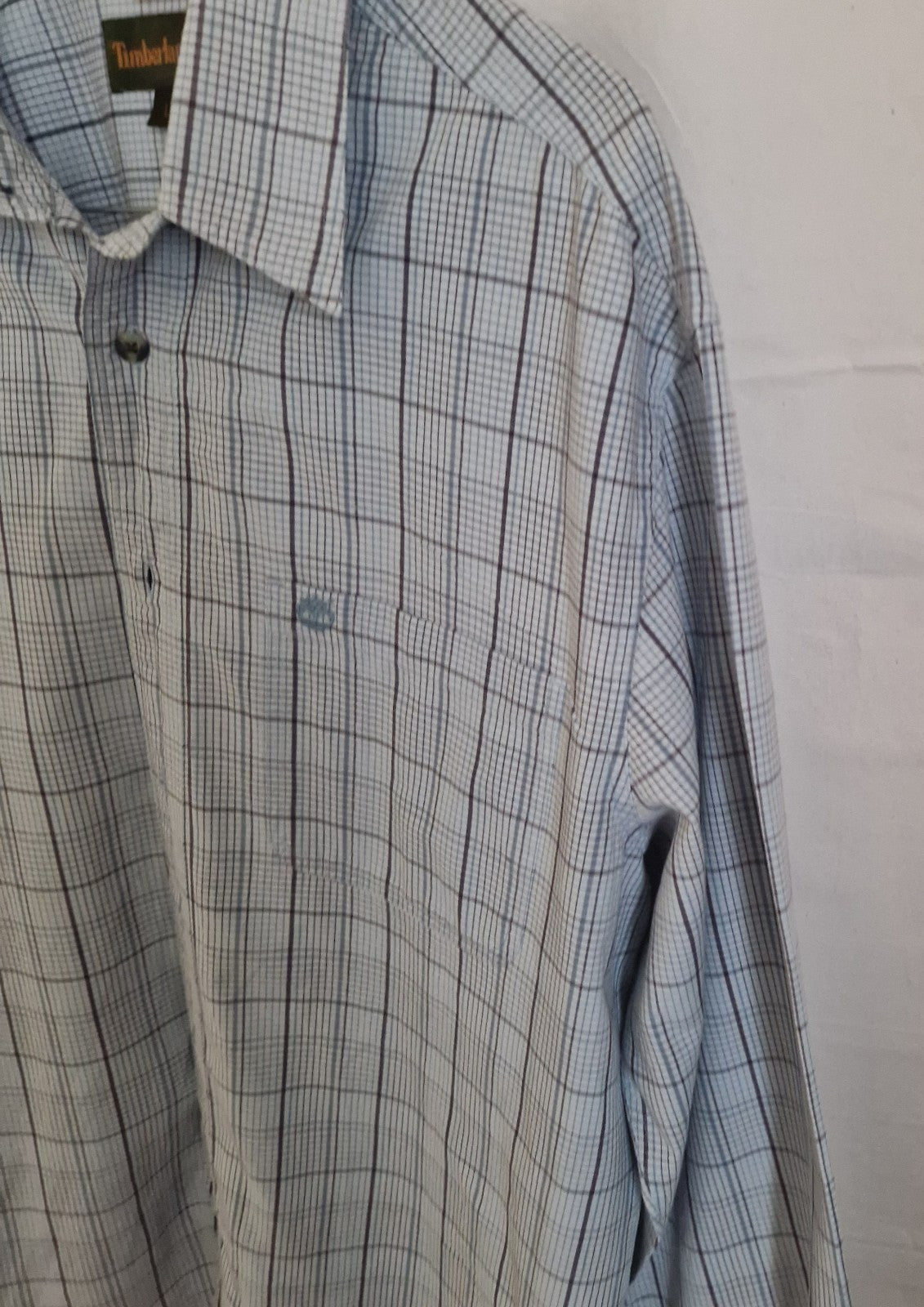 Timberland men's long-sleeve shirt in a grey and blue check pattern with a button-down collar.