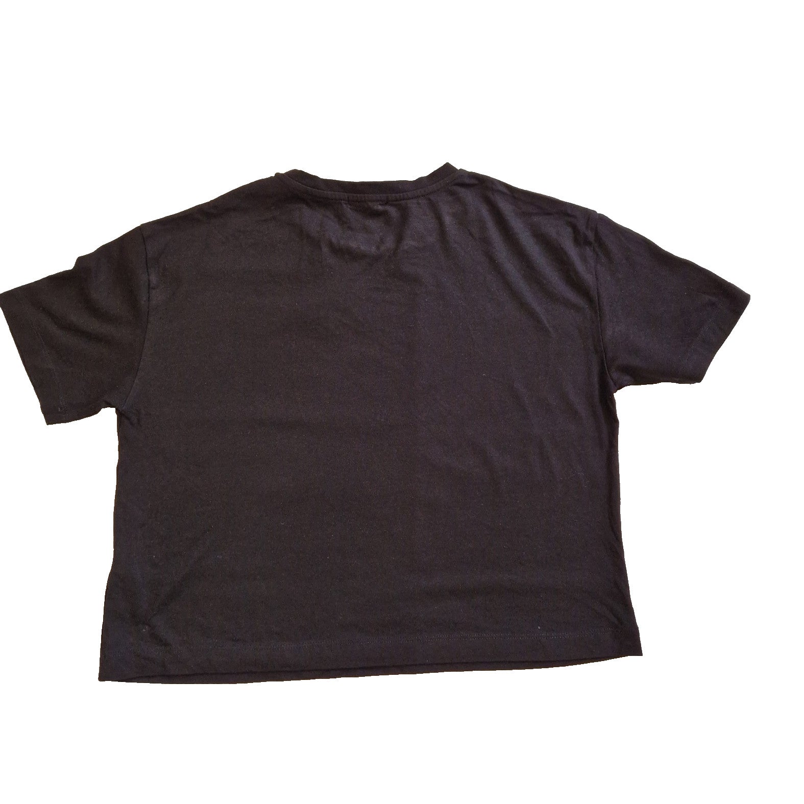 The back view of a plain black short-sleeved cotton t-shirt with a round neckline.