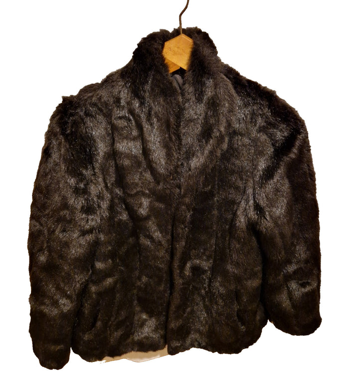 A dark brown vintage Astraka faux fur coat with a classic collar and long sleeves.