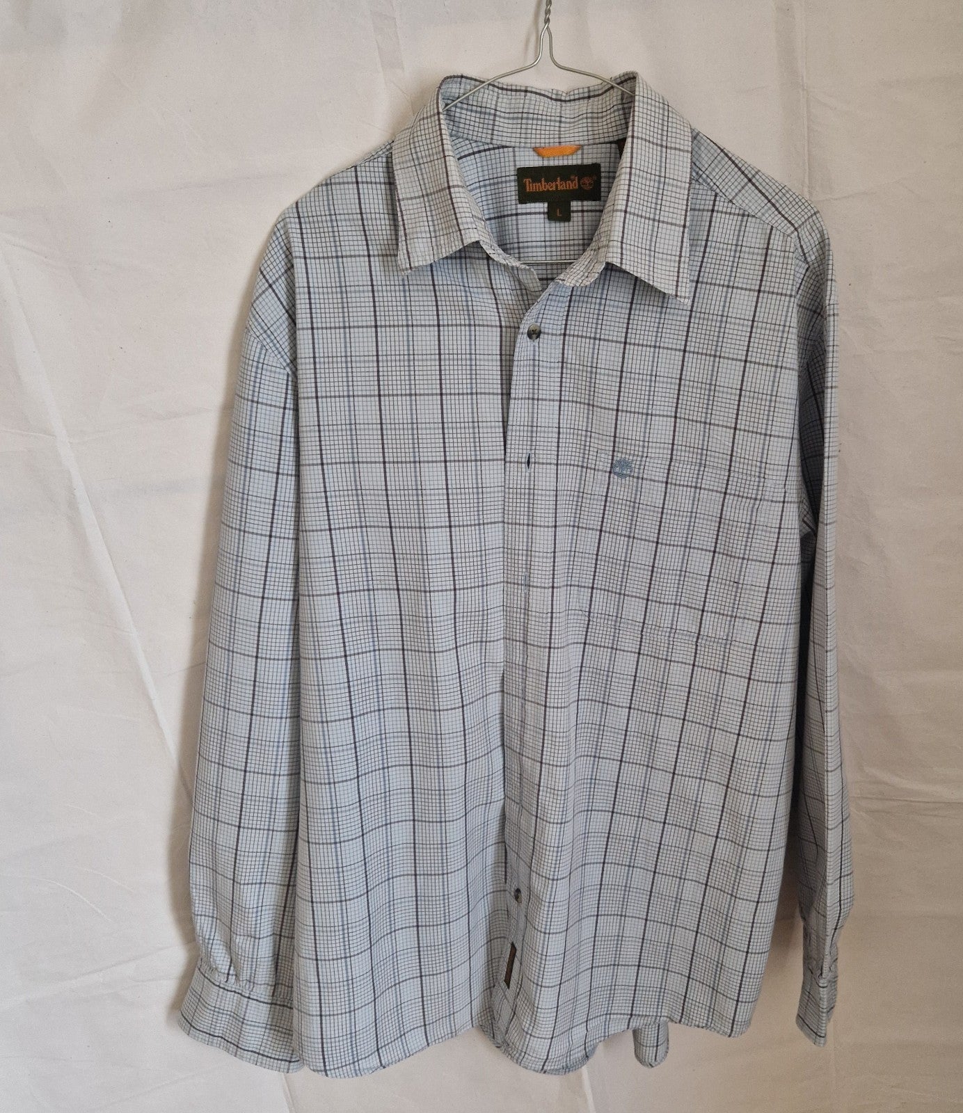 Timberland men's long-sleeve button-down shirt in a grey and blue check pattern.