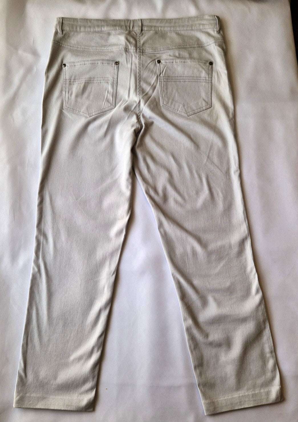 Beige Emreco straight leg corduroy chino trousers with back pockets and a button fly.