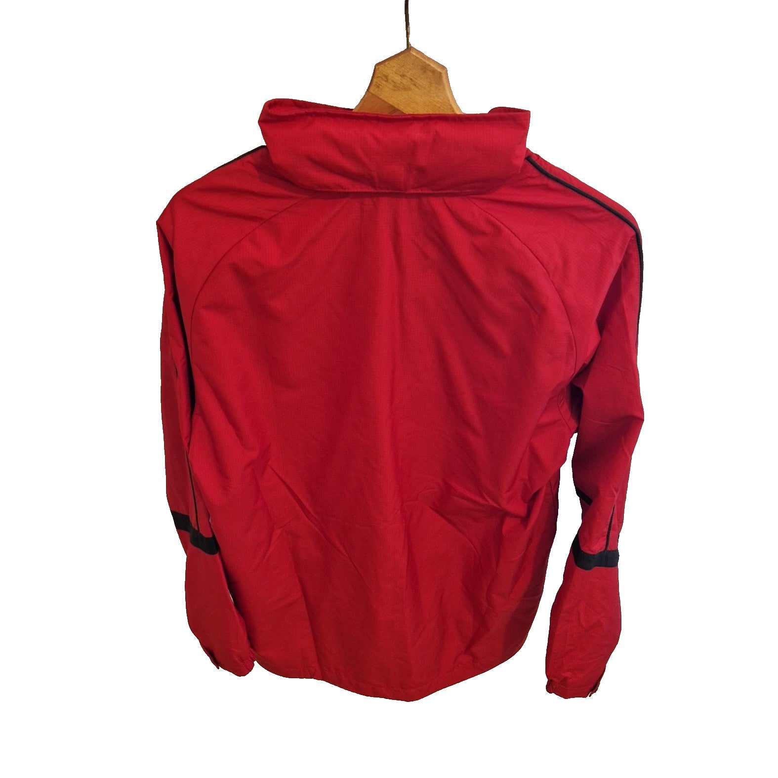 A red FBT Doncaster Rovers football training jacket with black accents hanging on a wooden hanger.