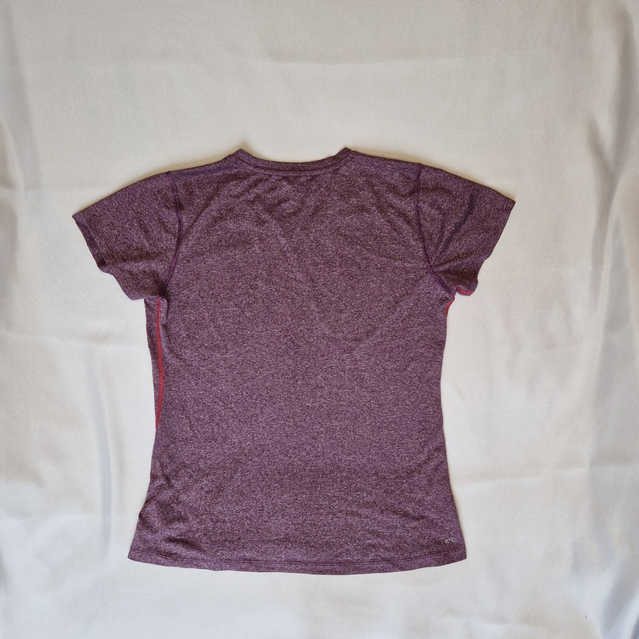 A purple New Balance women's short-sleeve running t-shirt with a round neck.