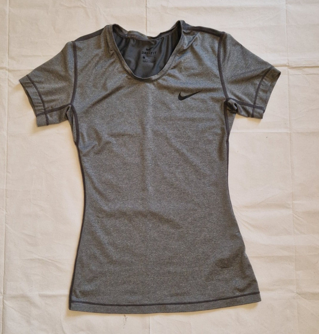 A grey Nike women's slim-fit Dri-FIT running t-shirt with a crew neckline.