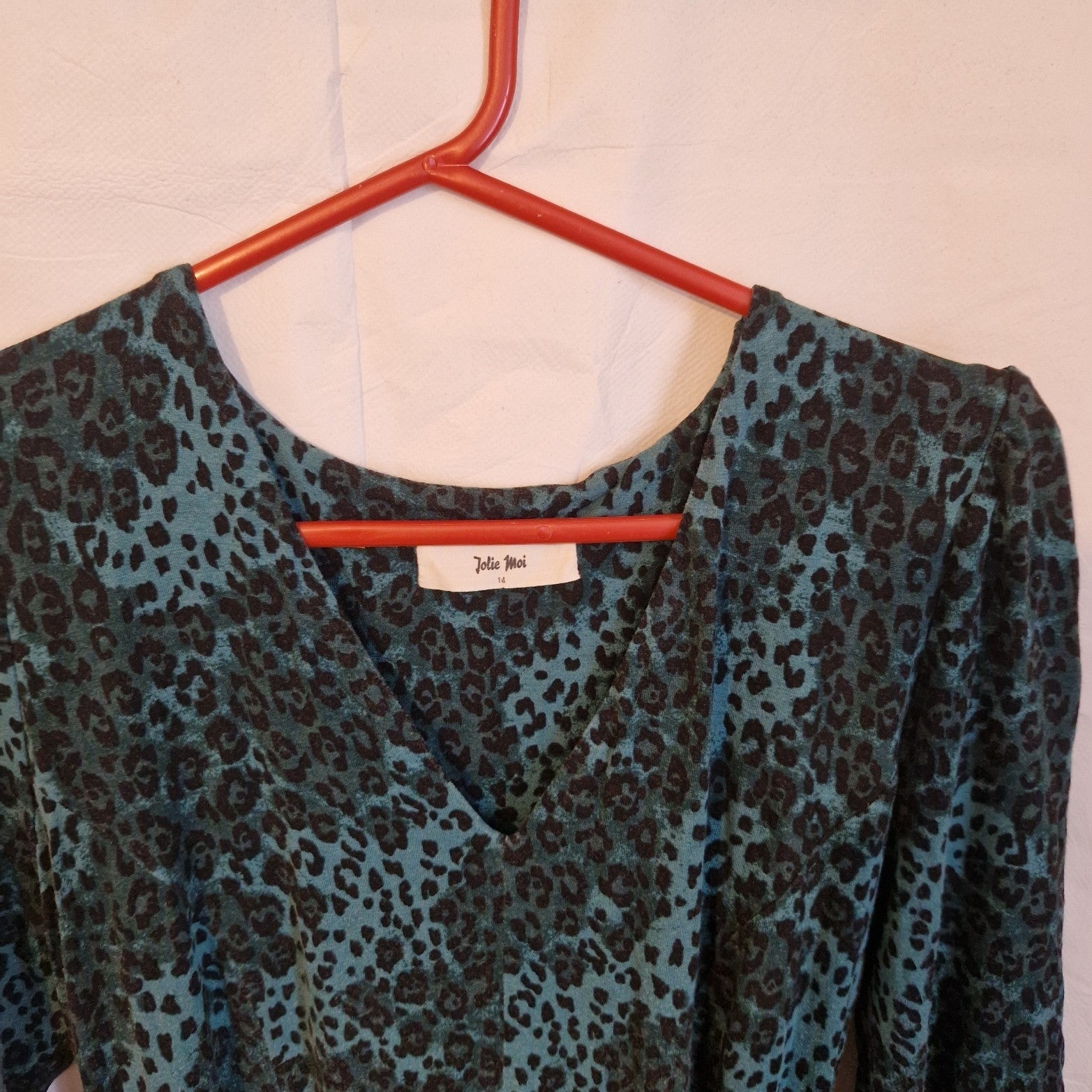 A teal and black leopard print Jolie Moi long-sleeve maxi dress with a round neckline.